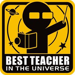 an icon of a silhouette holding a book and a wand, with stars and planets around them. Text reads "Best Teacher in the Universe." 